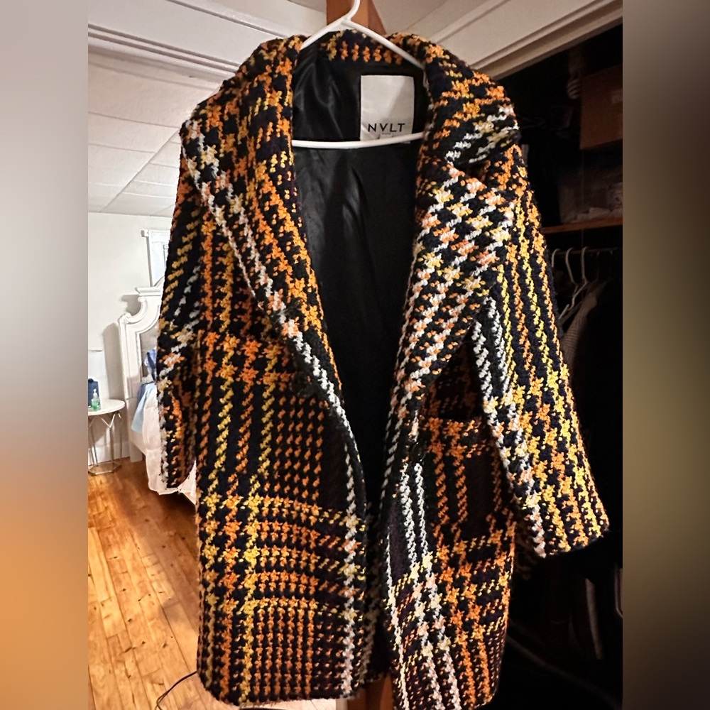Orange, black and white plaid wool (30% Wool, 70% Polyester).